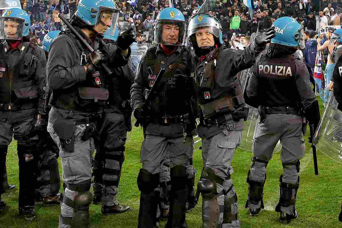 Polizia in campo in scontri tra tifosi